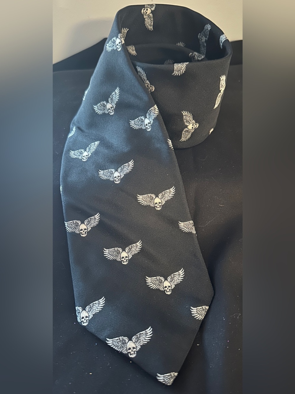 DKNY Black Tie with Silver Wing Motif